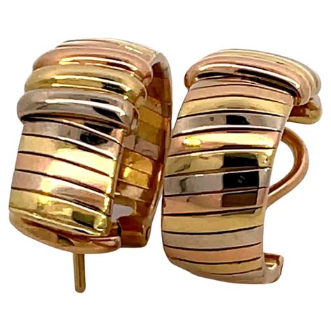 cartier 3 gold earrings.